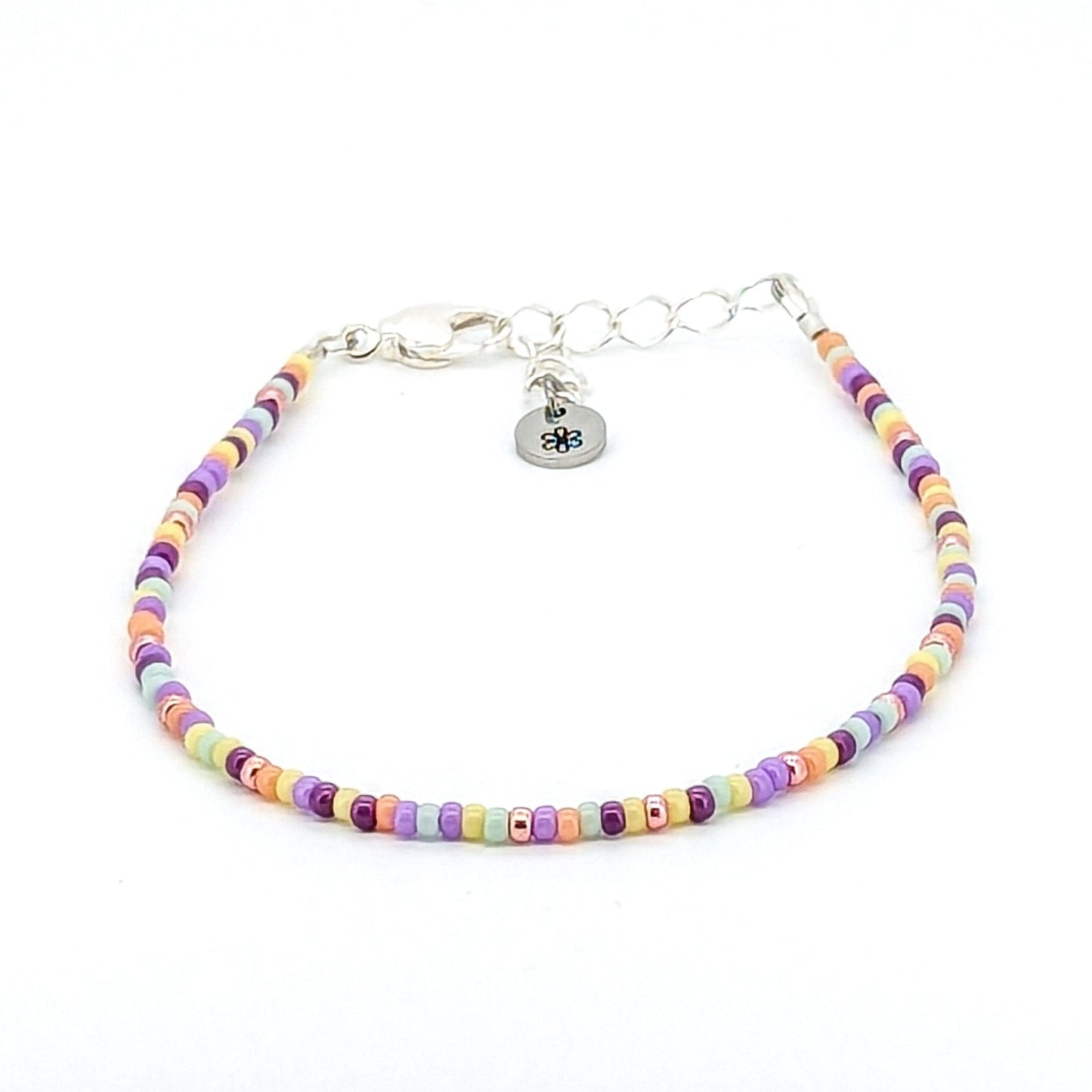 Dainty bracelet - Purple, peach, pale blue and pale yellow glass seed beads - creations by cherie