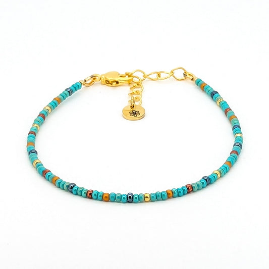 Dainty bracelet - turquoise, gunmetal, gold and copper glass seed beads - creations by cherie